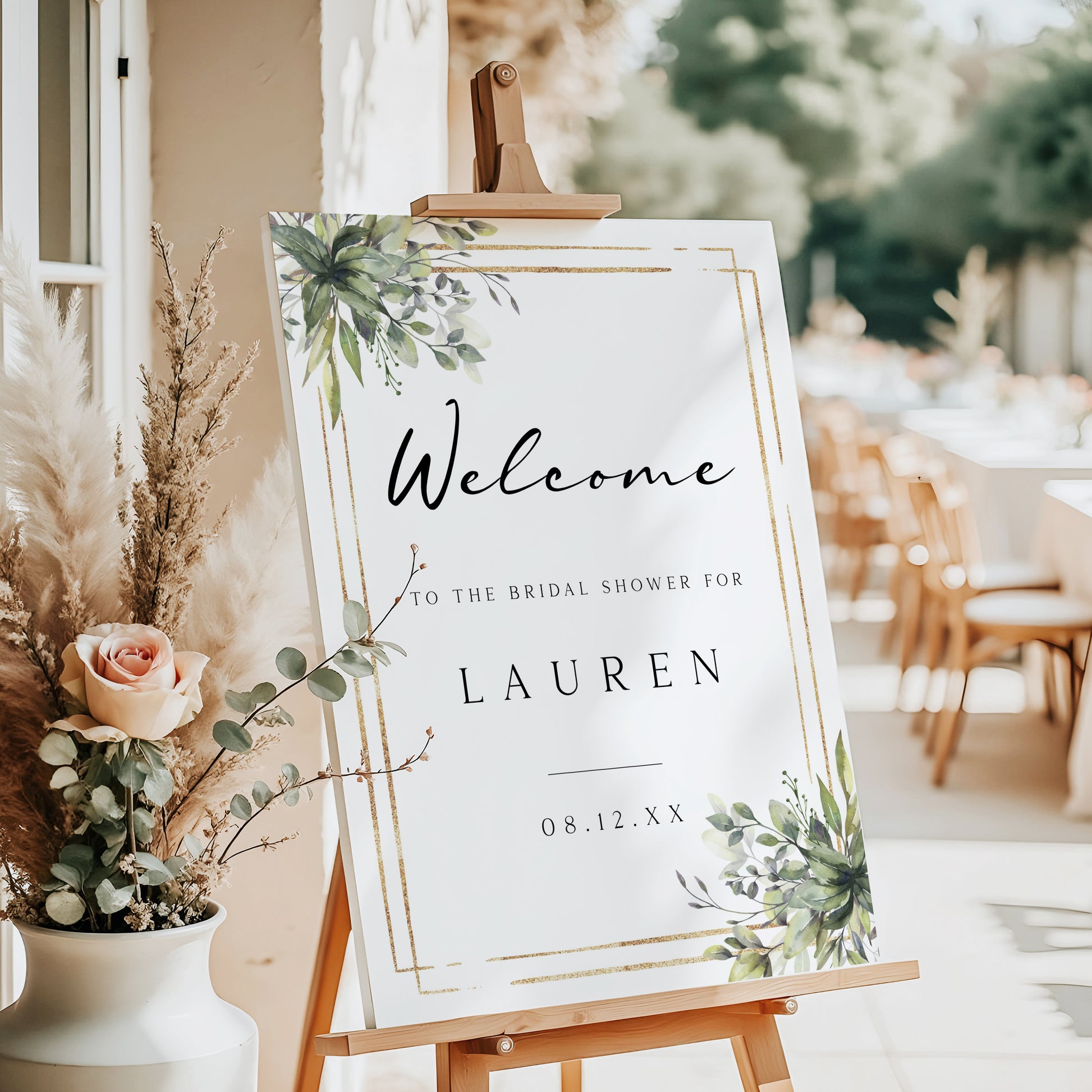 Eucalyptus greenery and gold frame bridal shower welcome sign template with watercolor botanicals in corner clusters, editable in Canva