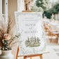 Editable garden estate wedding welcome sign Canva template with watercolour venue illustration, botanical border, and sage green tones
