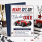 Race car first birthday invitation with red vintage race car, checkered flags, varsity ONE lettering, racing stripes, stars, and bold boys 1st birthday details