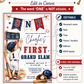 Baseball first birthday invitation featuring a little boy in a baseball uniform, ONE banner, scoreboard, bat, glove, helmet and red and navy details.
