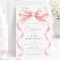 Pink bow birthday invitation for girls featuring a large blush pink ribbon, flowing bow tails and elegant pink and black typography.