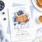 Blueberry baby brunch invitation with a watercolor stack of pancakes, syrup, and blueberries in blue and white