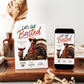 Friendsgiving invitation with Let’s Get Basted headline and illustrated turkey wearing sunglasses and holding a glass of red wine
