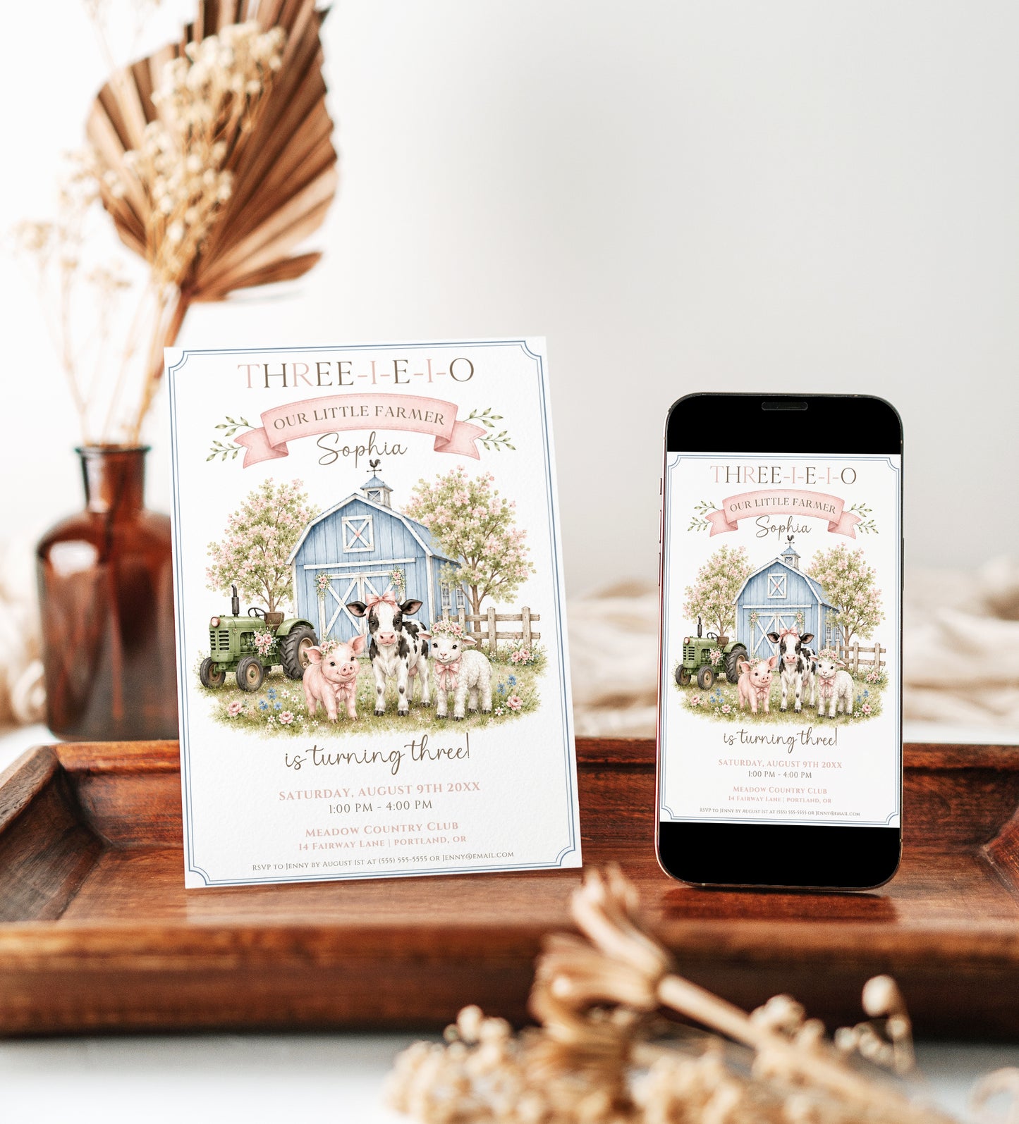 Our little farmer girl birthday invitation with a blue barn, green tractor, calf, piglet, and lamb in pink bows in soft pink and blue