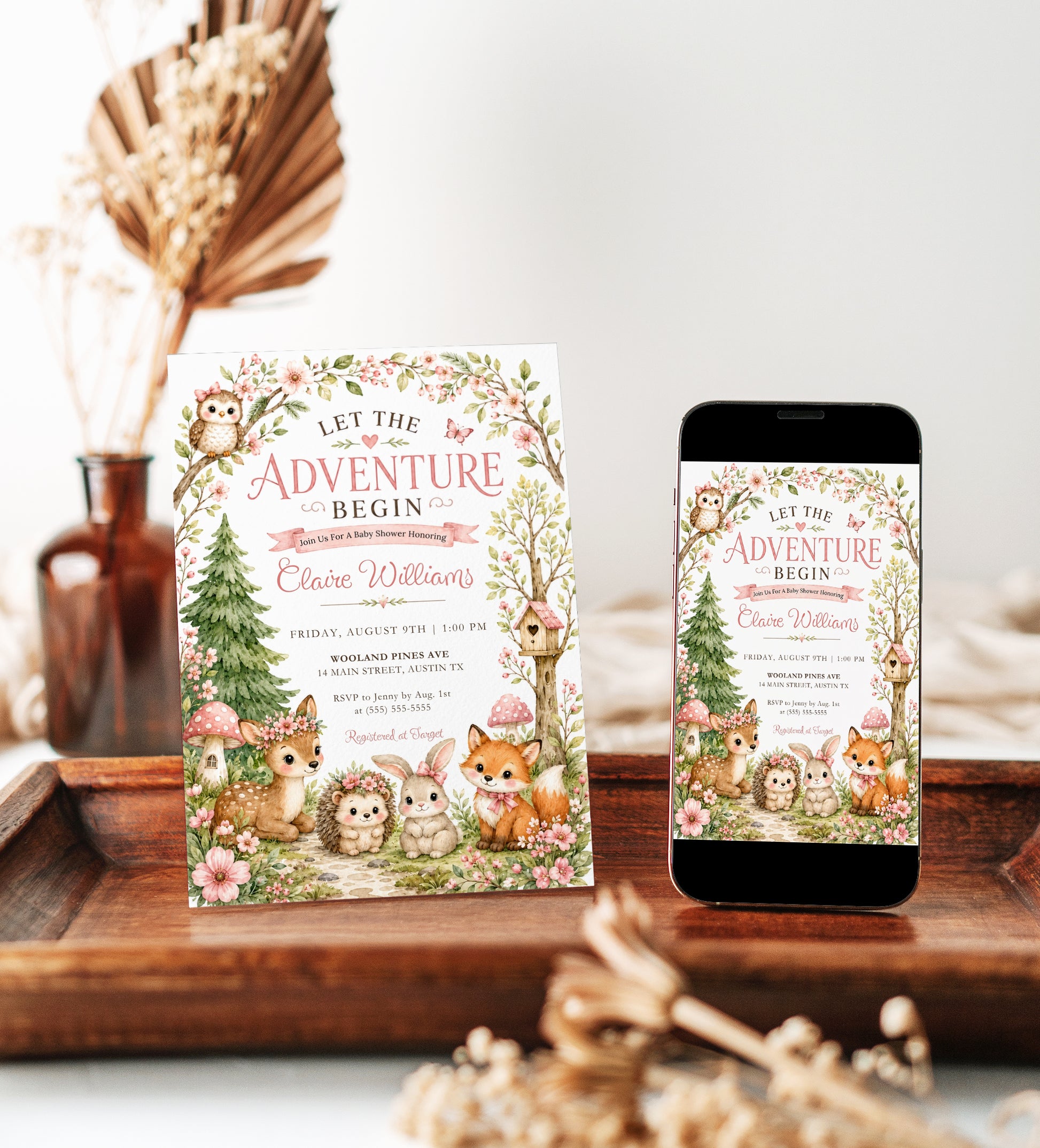 Woodland baby girl shower invitation with deer, fox, bunny, hedgehog, owl, pink flowers, leafy branches, mushrooms, birdhouse, and soft forest details