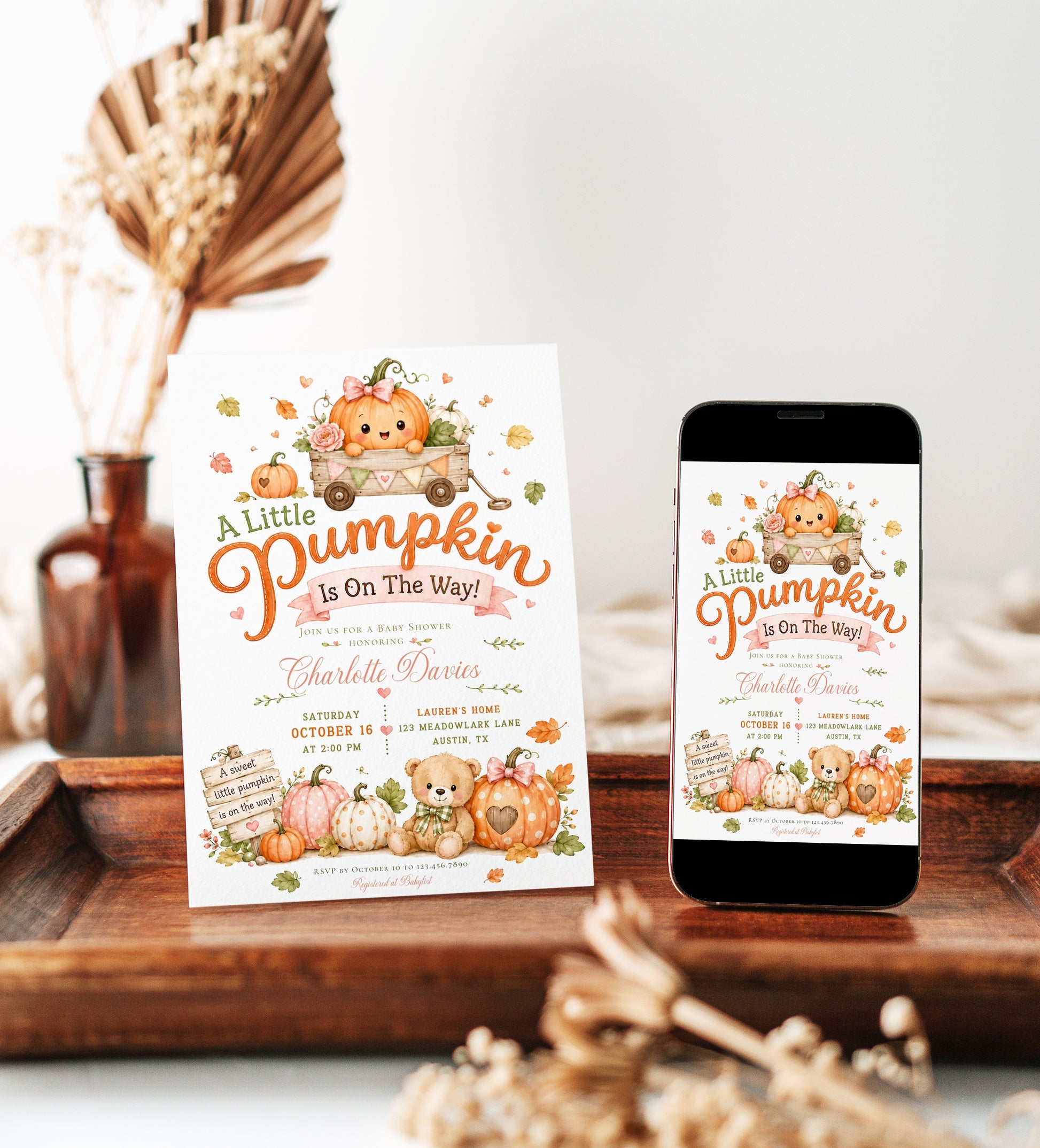 Little pumpkin baby shower invitation with pumpkins, teddy bear, wooden wagon, autumn leaves, pink bows, rustic sign, florals, and soft fall details