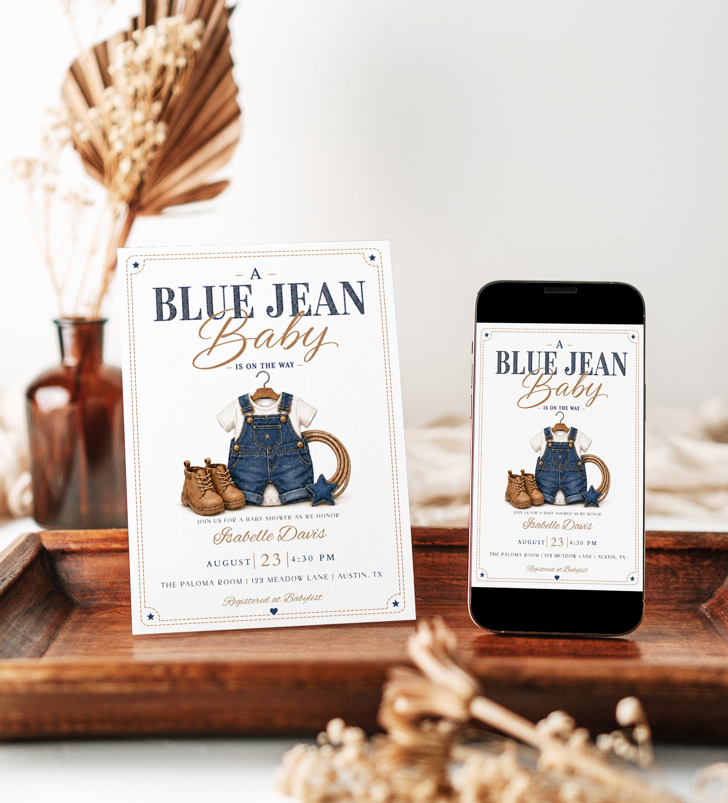 Blue jean baby shower invitation with denim overalls, brown boots, and a lasso in denim blue and caramel