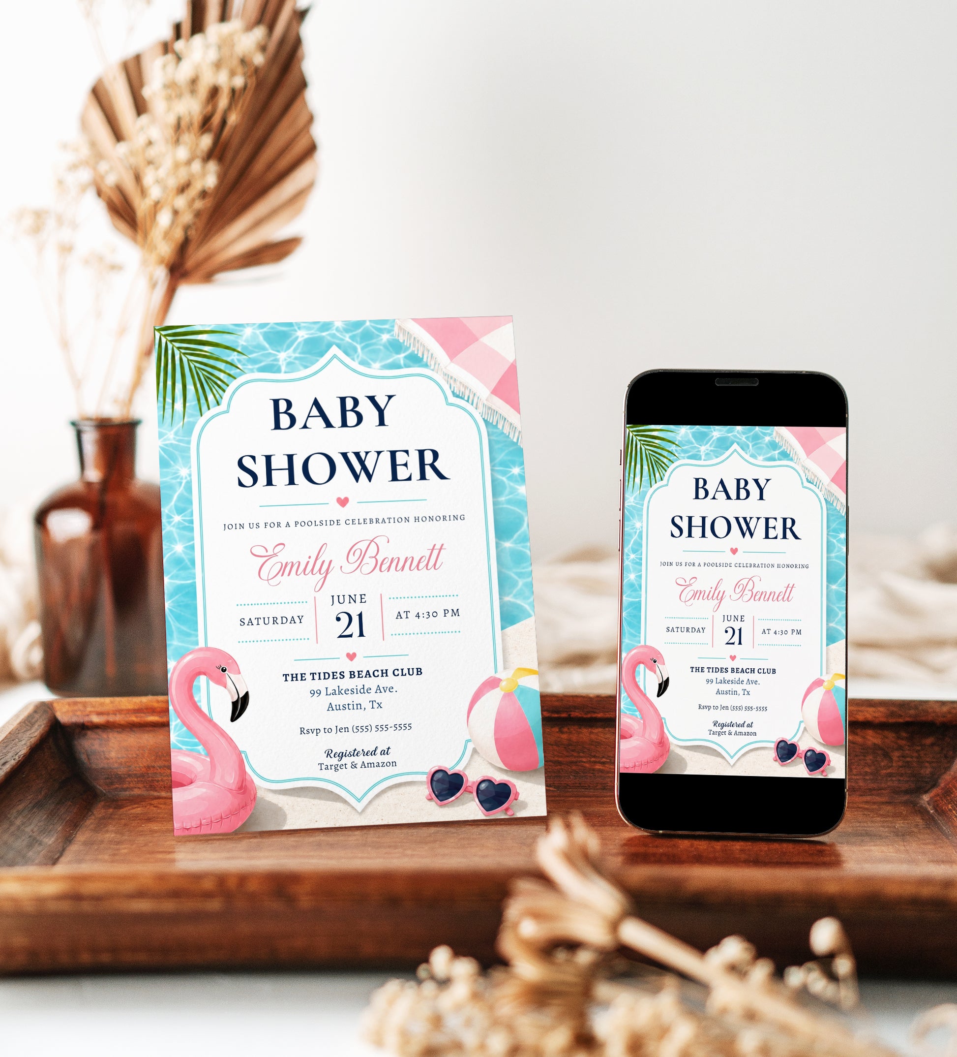 Tropical flamingo baby shower invitation with a flamingo float, beach ball, and heart sunglasses in navy, pink, and aqua