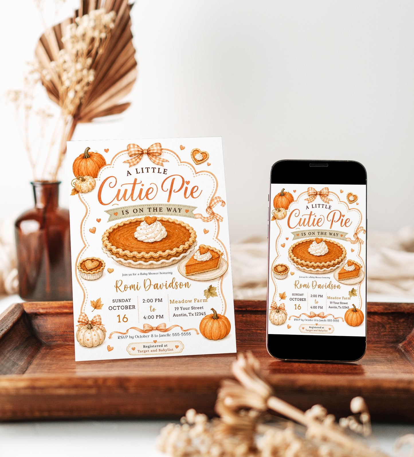 Cutie pie baby shower invitation with pumpkin pie, pumpkins, gingham bows, autumn leaves, mini pies, and cozy fall baby shower details