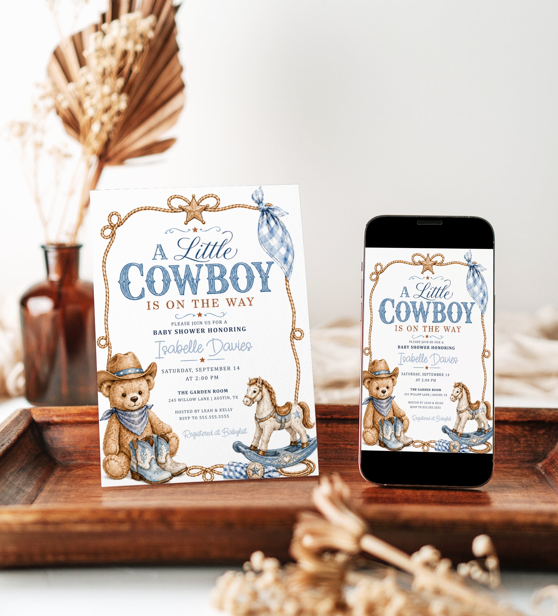 Little cowboy baby shower invitation with teddy bear cowboy, blue cowboy boots, rocking horse, rope border, sheriff star, gingham bandana, and western details
