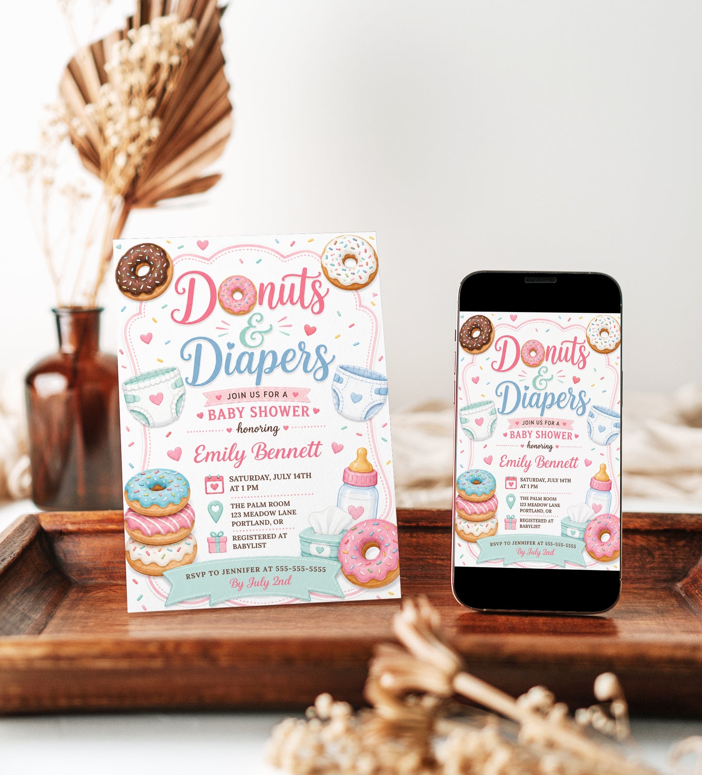 Editable donuts and diapers baby shower invitation Canva template with illustrated donuts, diapers, baby bottle, wipes, hearts and sprinkles in pink, mint, and blue on a white background