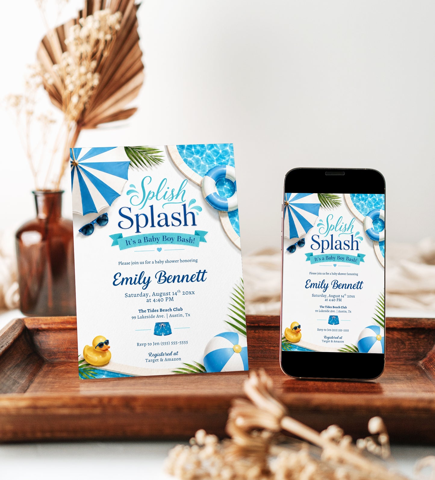 Splish splash boy baby shower invitation with a pool ring, rubber duck, and beach ball in blue and white