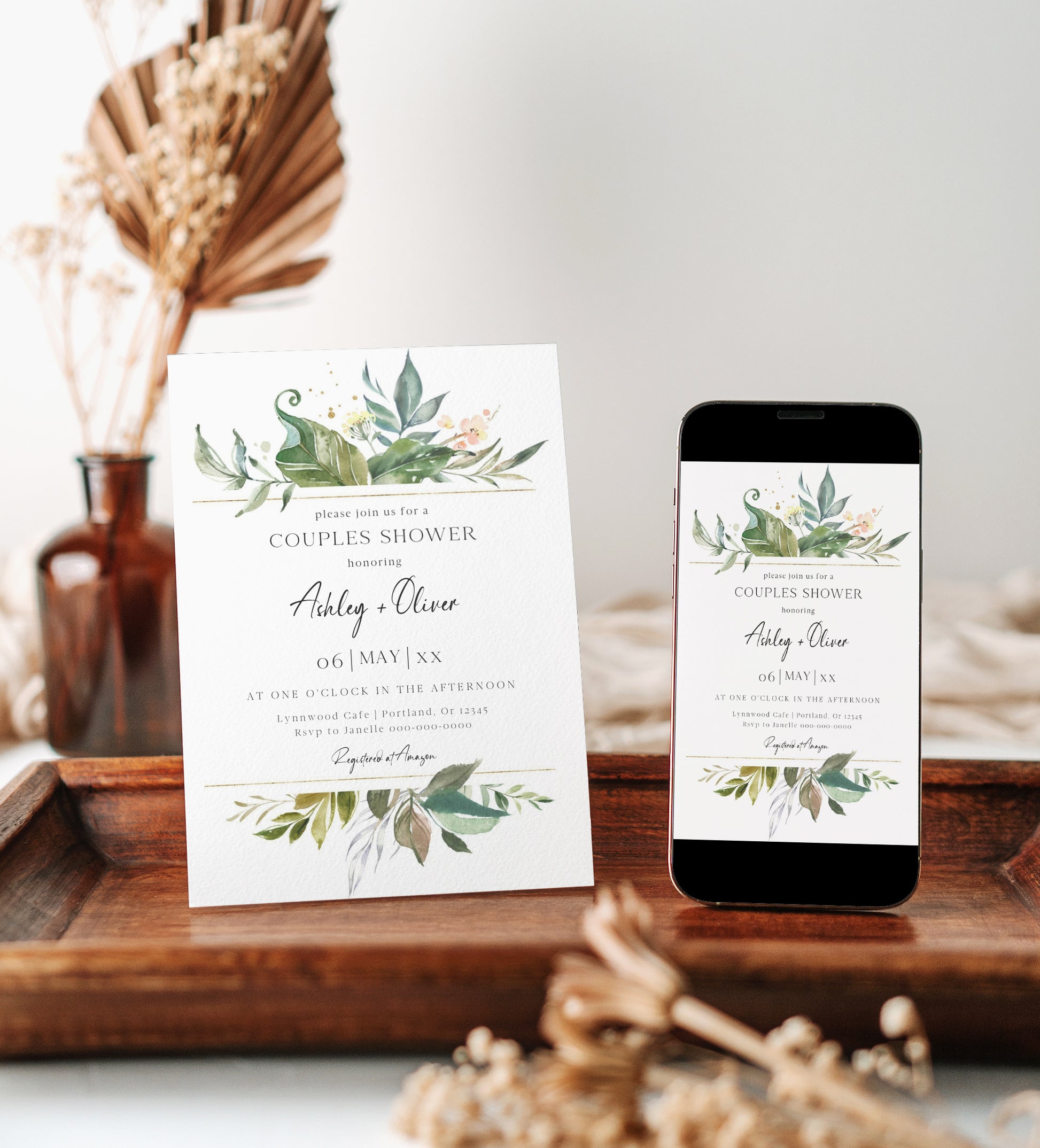 Greenery botanical couples shower invitation template with watercolor tropical leaves, gold line borders, and peach floral accent, editable in Canva