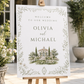 Editable garden estate wedding welcome sign Canva template with watercolour venue illustration, botanical border, and sage green tones
