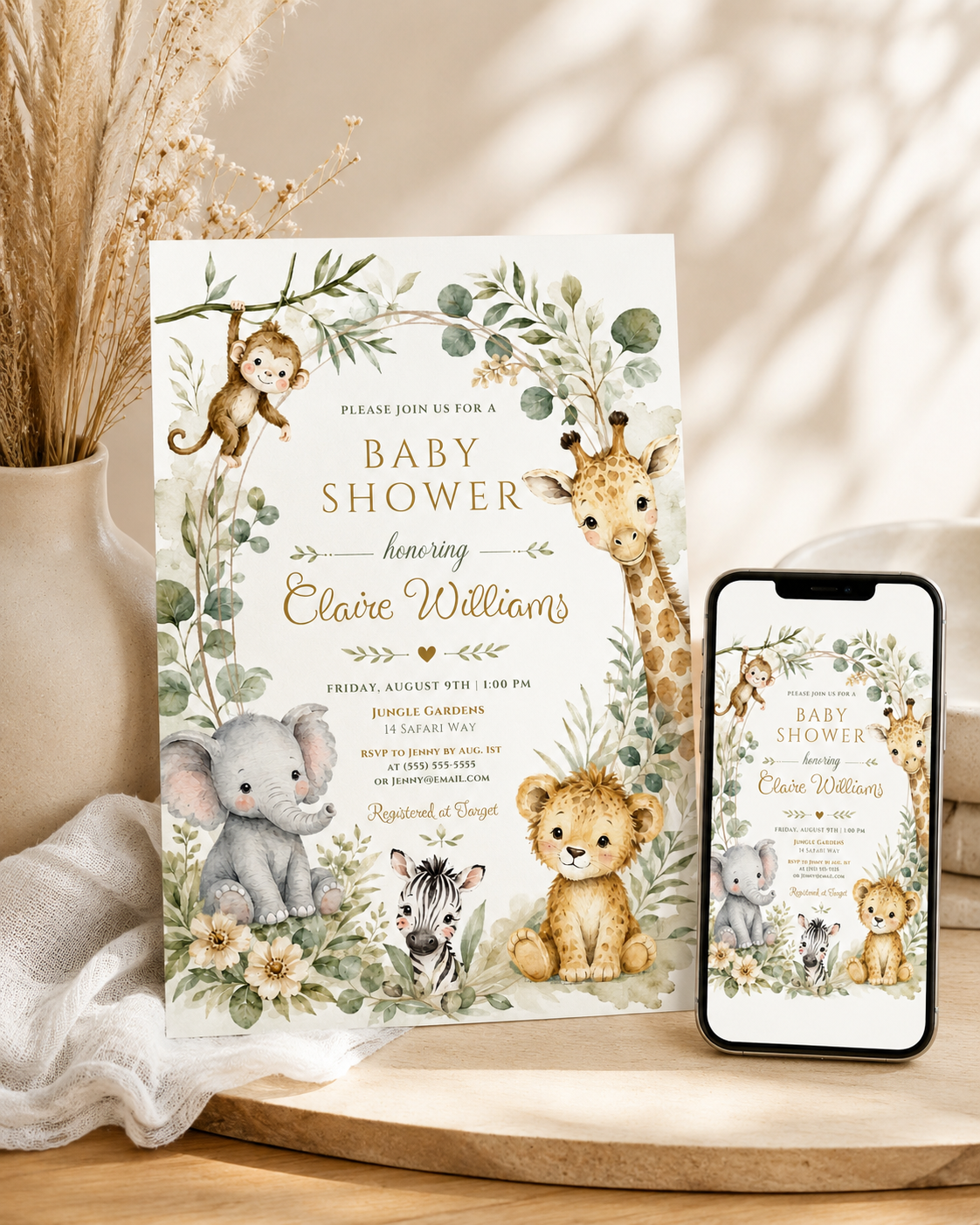 Editable safari baby shower invitation Canva template with watercolour monkey, giraffe, elephant, lion cub, and zebra surrounded by eucalyptus, tropical leaves, and cream wildflowers on a white background