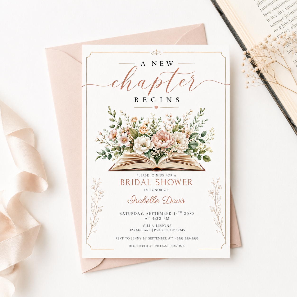 A New Chapter bridal shower invitation featuring an open book surrounded by blush pink and terracotta florals with green foliage.
