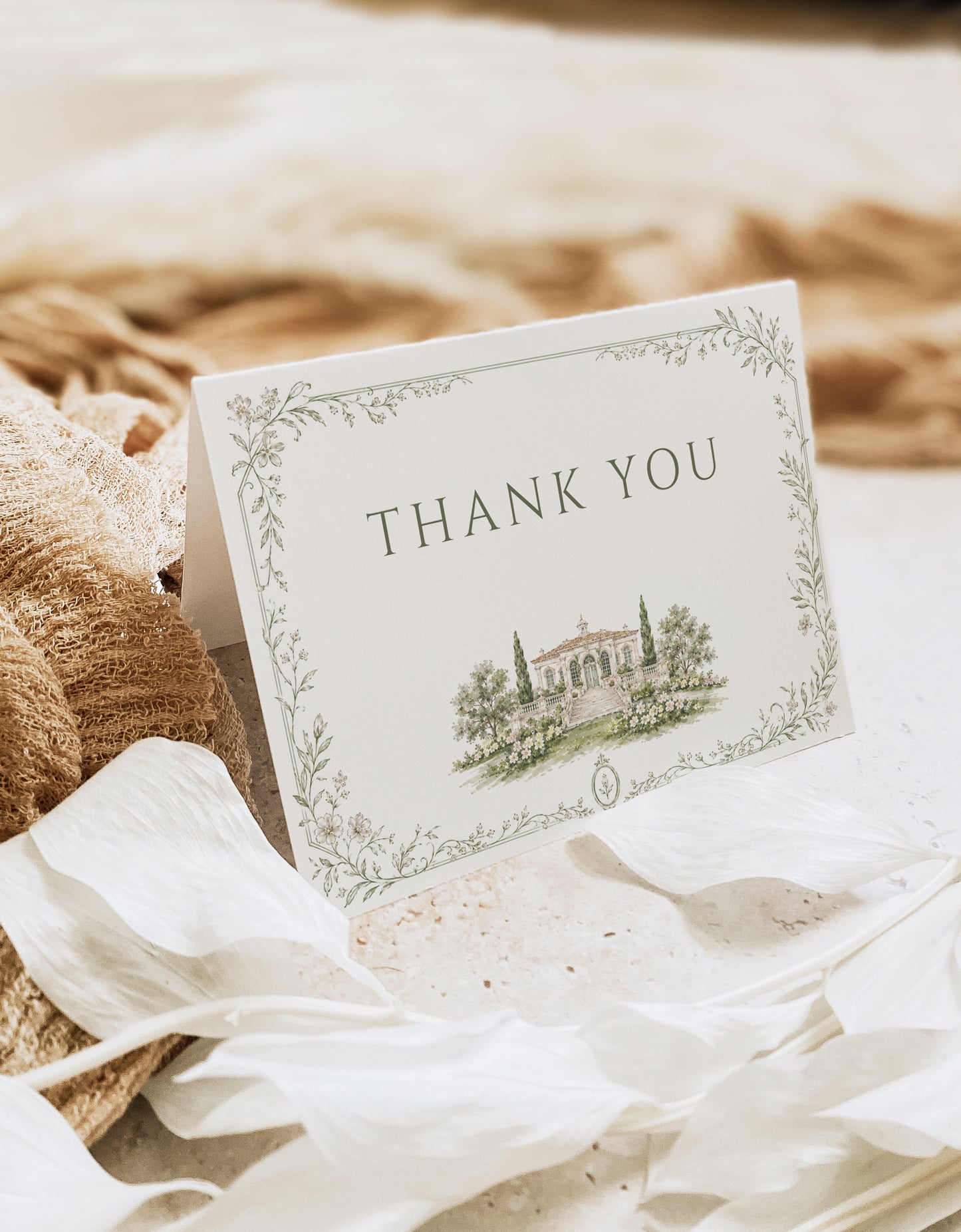 Garden estate wedding folded thank you card template with watercolor estate illustration and delicate sage botanical vine border, editable in Canva