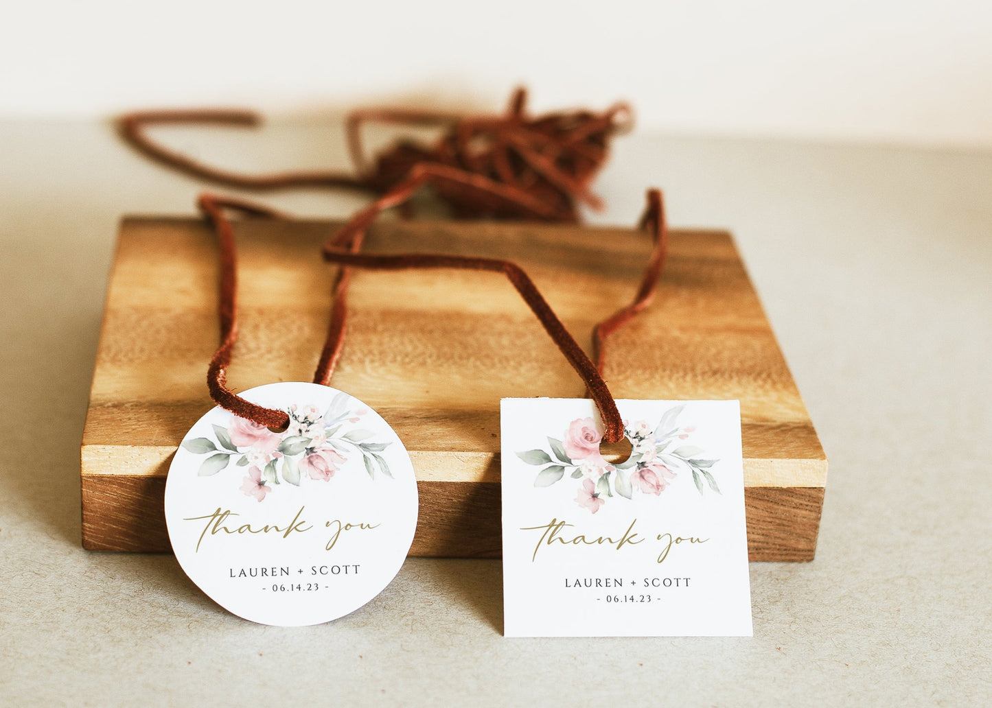 Blush pink floral and gold wedding thank you gift tag template with watercolor roses, sage greenery, and gold calligraphy script, editable in Canva