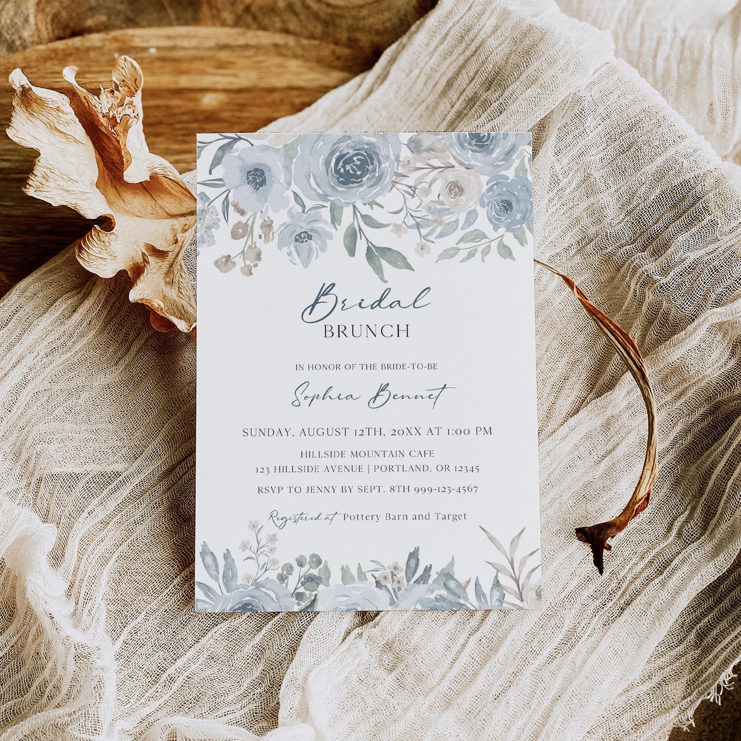 Dusty blue and cream floral bridal brunch invitation template with watercolor roses and botanicals in muted blue and sage, editable in Canva