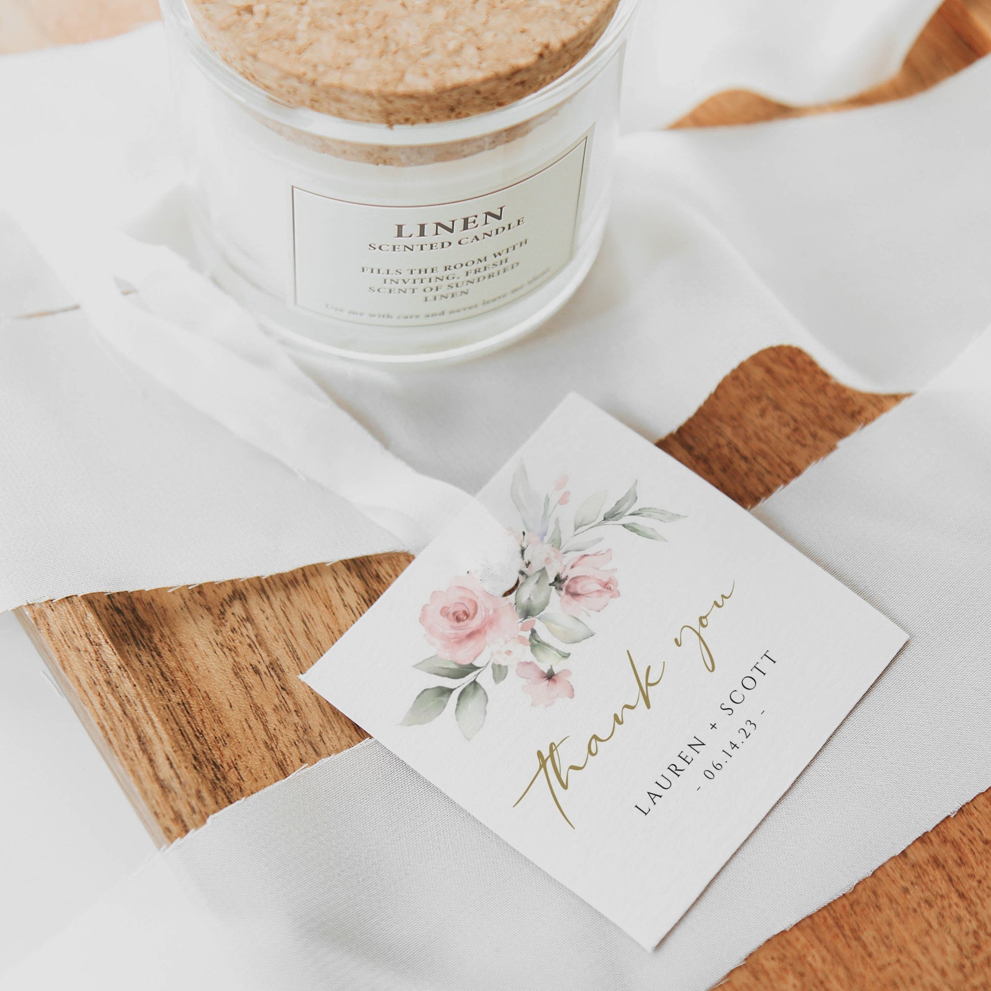 Blush pink floral and gold wedding thank you gift tag template with watercolor roses, sage greenery, and gold calligraphy script, editable in Canva