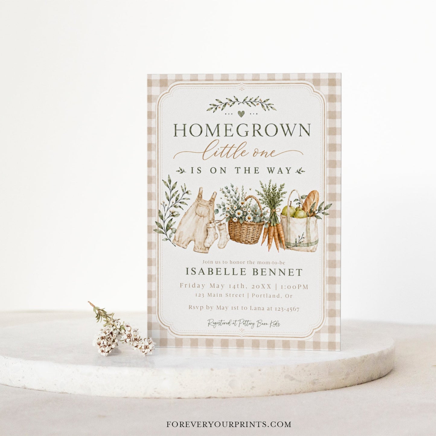 Editable homegrown baby shower invitation Canva template with watercolour baby overalls, daisy basket, carrots, market tote, gingham background, and olive branch accents