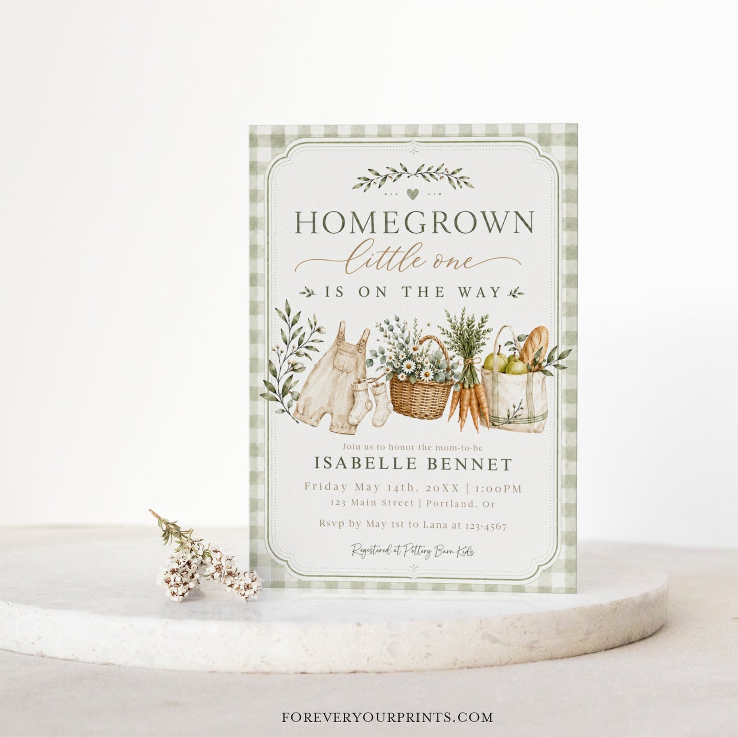 Editable homegrown baby shower invitation Canva template with watercolour baby overalls, daisy basket, carrots, market tote, sage gingham background, and olive branch accents