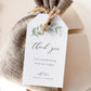 Greenery branch wedding thank you gift tag template with hand-painted watercolor botanical leaves and calligraphy script, editable in Canva