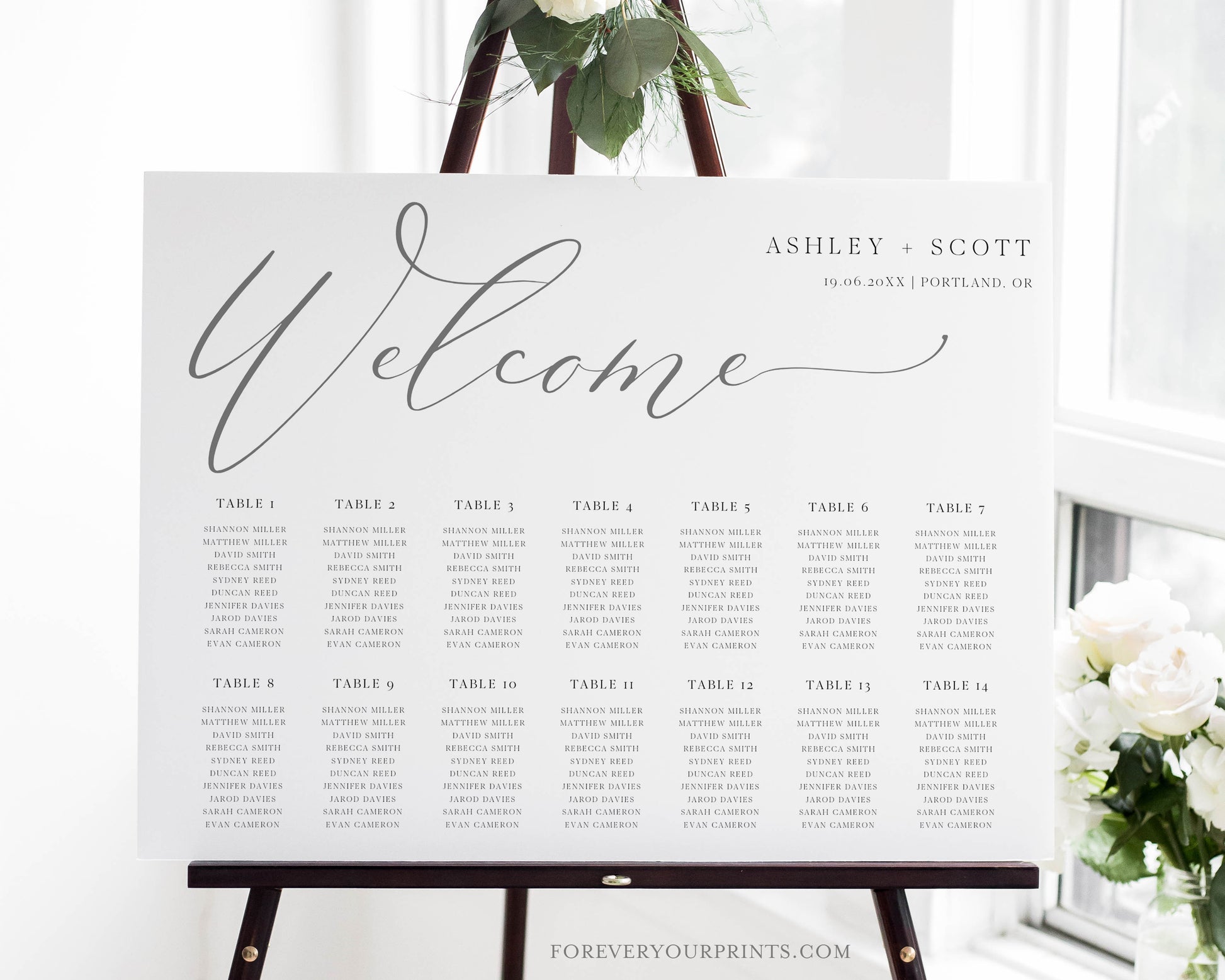 Minimalist gray horizontal wedding seating chart template with oversized calligraphy welcome script and 14 table layout, editable in Canva