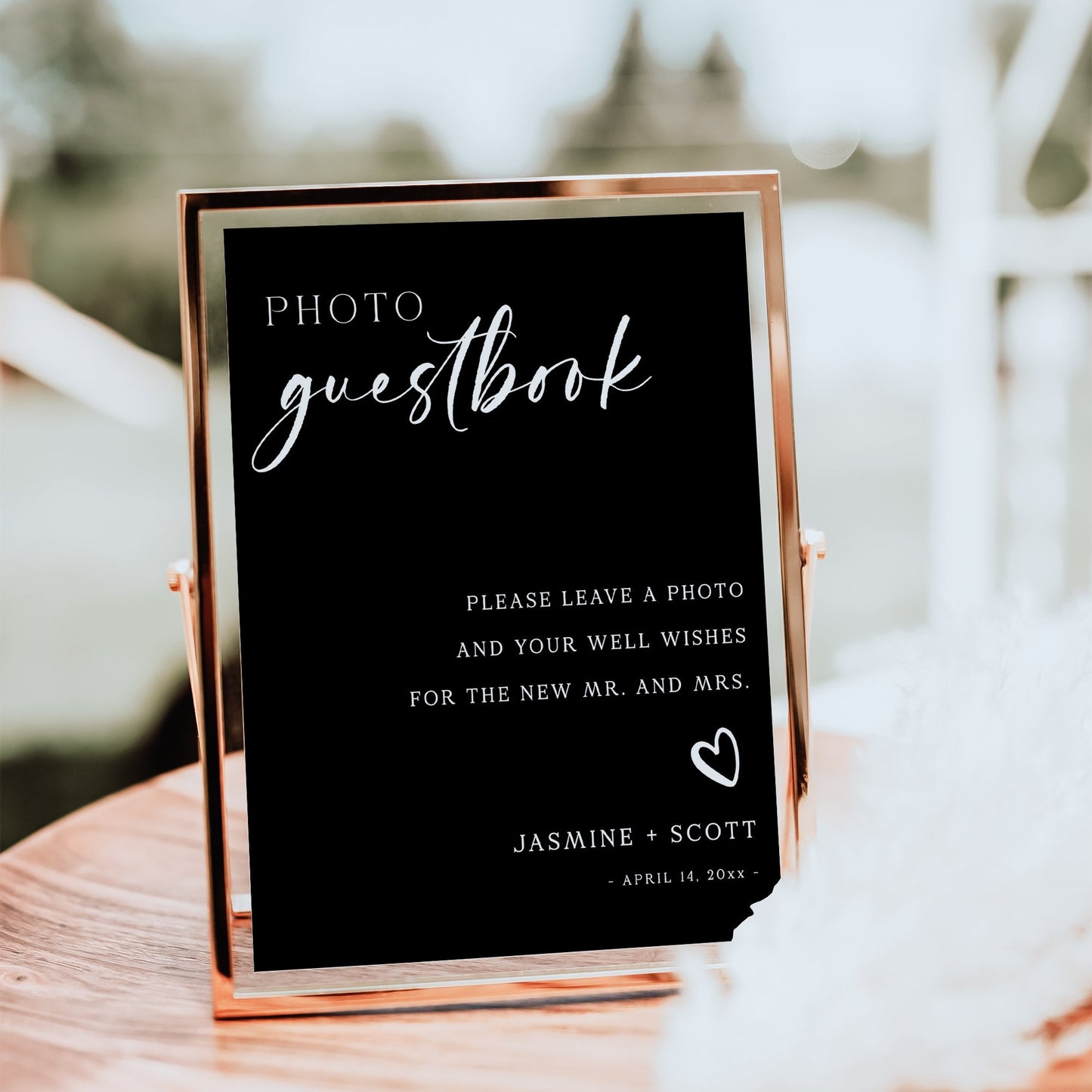 Black minimalist photo guestbook sign with elegant script and serif font, editable for wedding decor | www.foreveryourprints.com