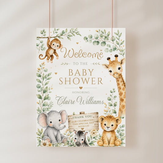 Editable safari baby shower welcome sign Canva template with watercolour monkey, giraffe, elephant, lion cub, and zebra surrounded by eucalyptus and tropical leaves with gold accents on a white background