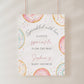 Editable donuts and sprinkles baby shower welcome sign Canva template with watercolour pastel donuts, rainbow sprinkles, and script typography on a soft white background