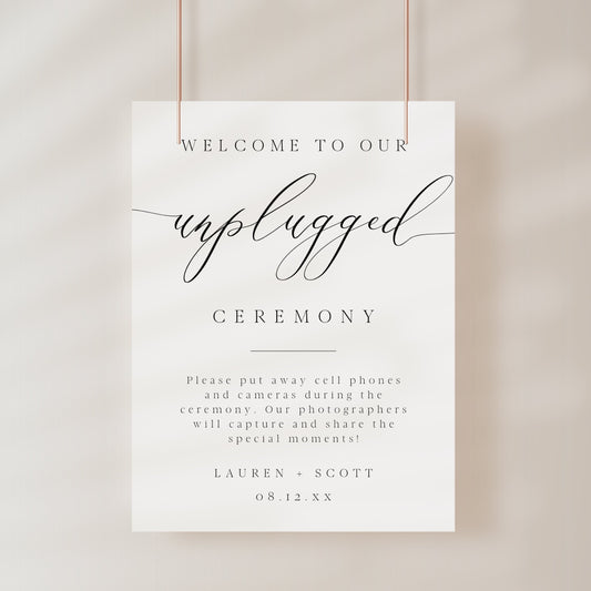 Minimalist black and white wedding unplugged ceremony sign template with oversized calligraphy script and spaced serif typography, editable in Canva
