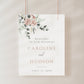 Blush floral and eucalyptus greenery wedding welcome sign template with rose gold spaced lettering on cream background, editable in Canva