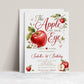 Apple of our eye birthday invitation with watercolor red apples, leafy branches, apple blossoms, hearts, elegant script lettering, and orchard birthday details