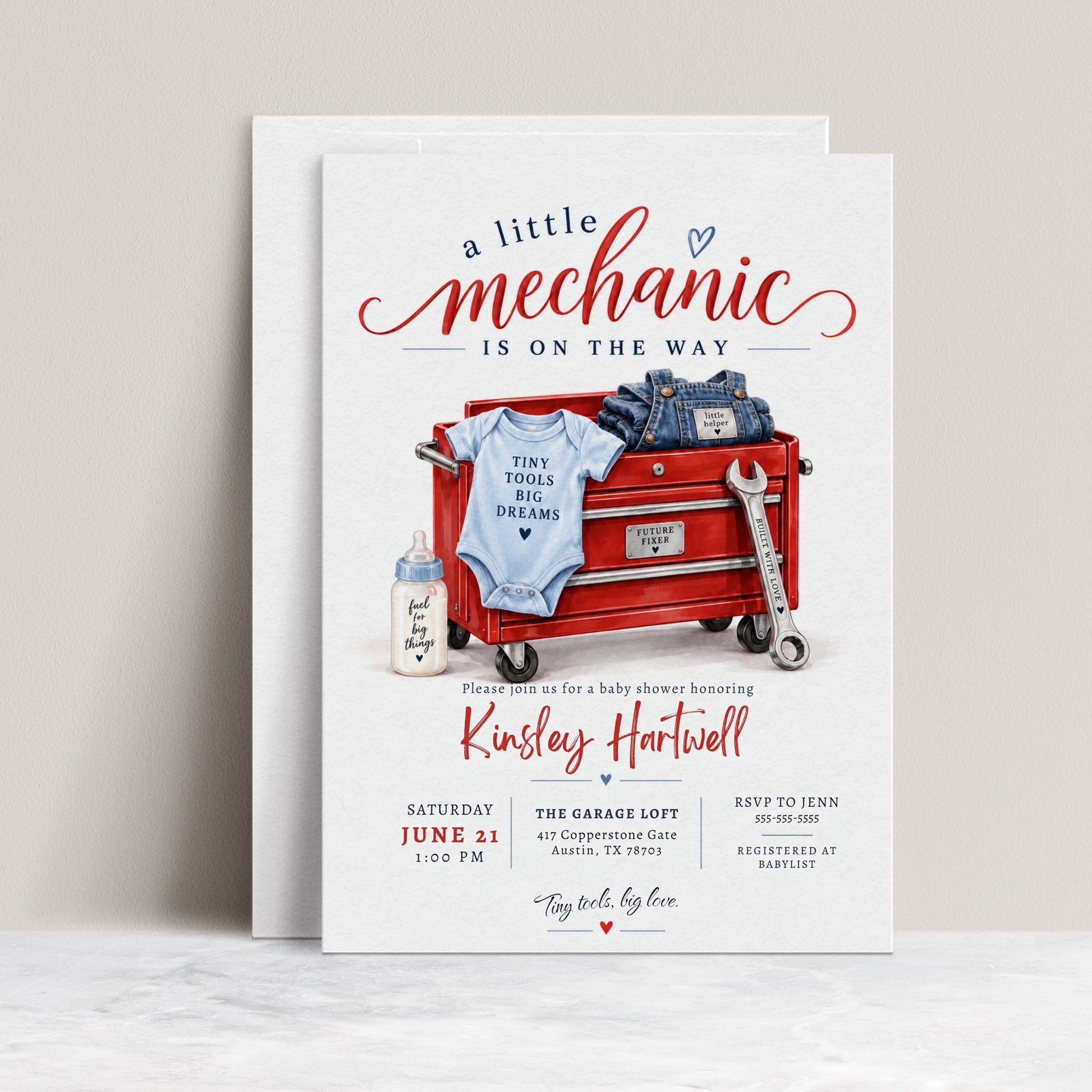 Little mechanic baby shower invitation with red tool chest, wrench, baby overalls, bodysuit, bottle, and garage-themed baby boy shower details