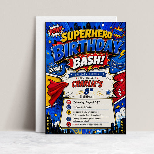 Superhero birthday invitation featuring a bold comic book design with POW, BAM and ZOOM graphics, city skyline, cape, mask, stars and lightning bolts.
