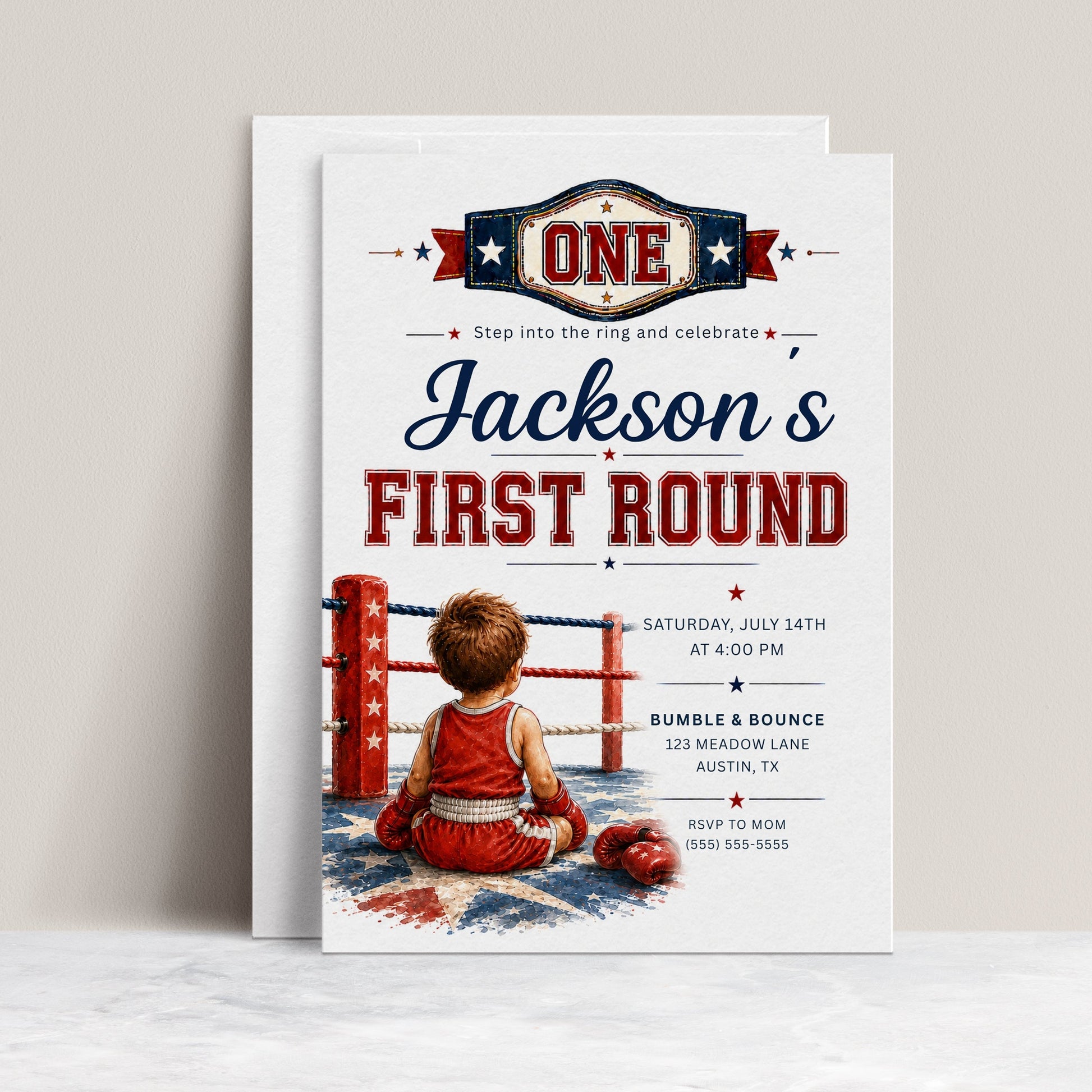First Round first birthday invitation with championship belt, boxing ring ropes, red and blue stars, and little boxer artwork for a boxing birthday party