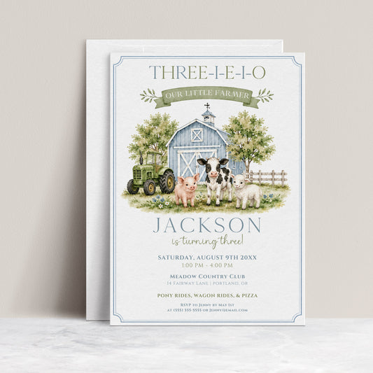Our little farmer birthday invitation with a blue barn, green tractor, cow, pig, and lamb in soft blue and green