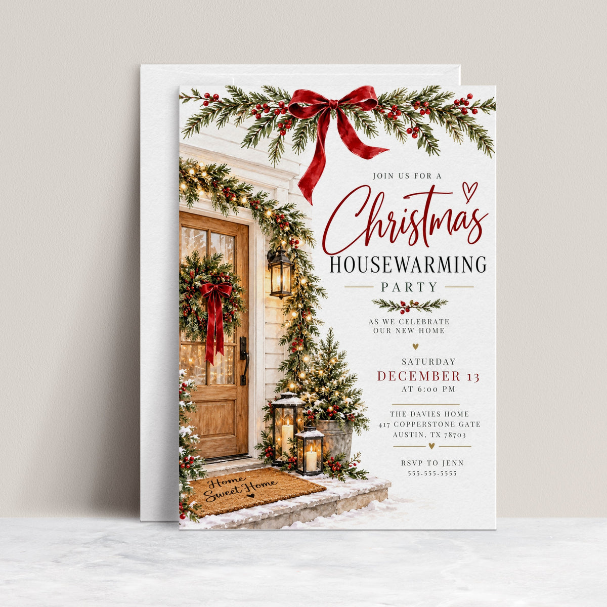 Christmas housewarming party invitation with a wooden front door, evergreen wreath and garlands, red bows, glowing lanterns, snowy steps, and a Home Sweet Home doormat