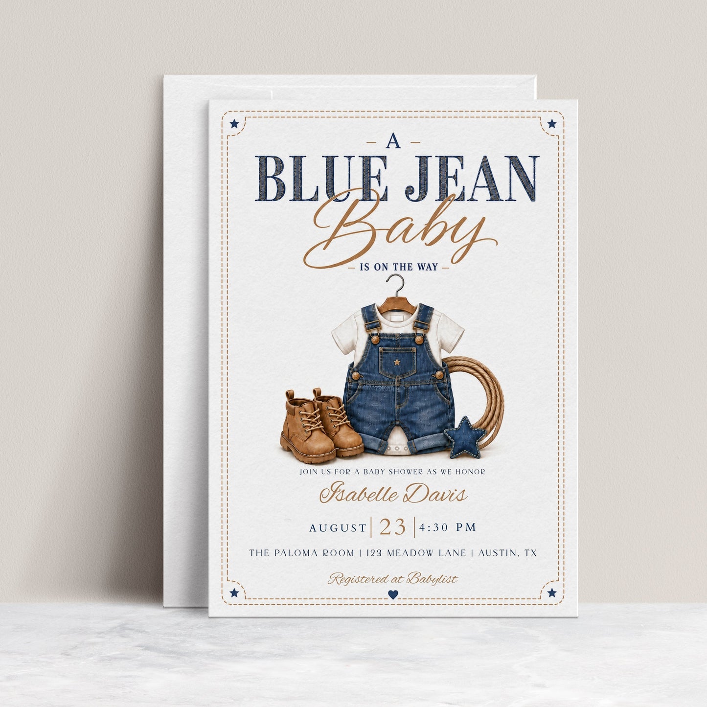 Blue jean baby shower invitation with denim overalls, brown boots, and a lasso in denim blue and caramel