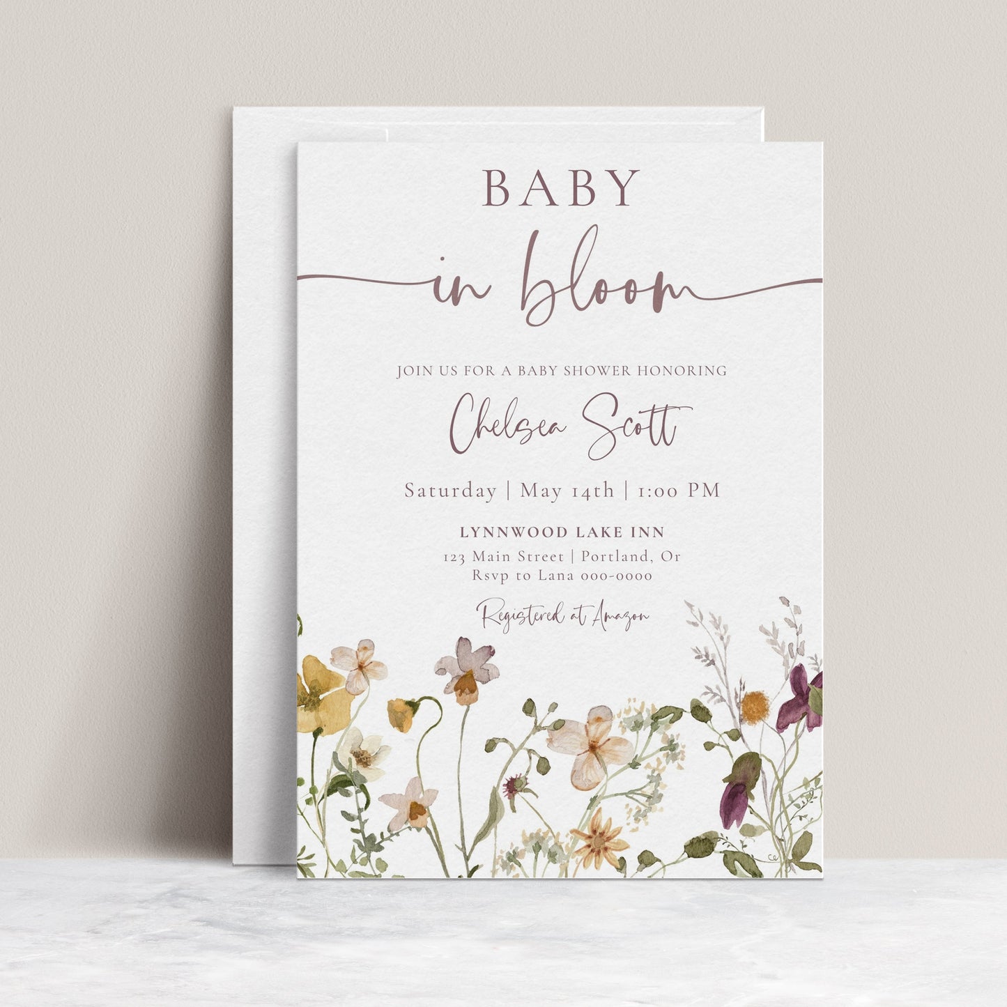Baby in bloom wildflower baby shower invitation template with watercolor meadow flowers in yellow, purple, and cream, editable in Canva