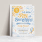 A little ray of sunshine baby shower invitation with golden sun, soft blue clouds, stars, hearts, and a blue and yellow hot air balloon