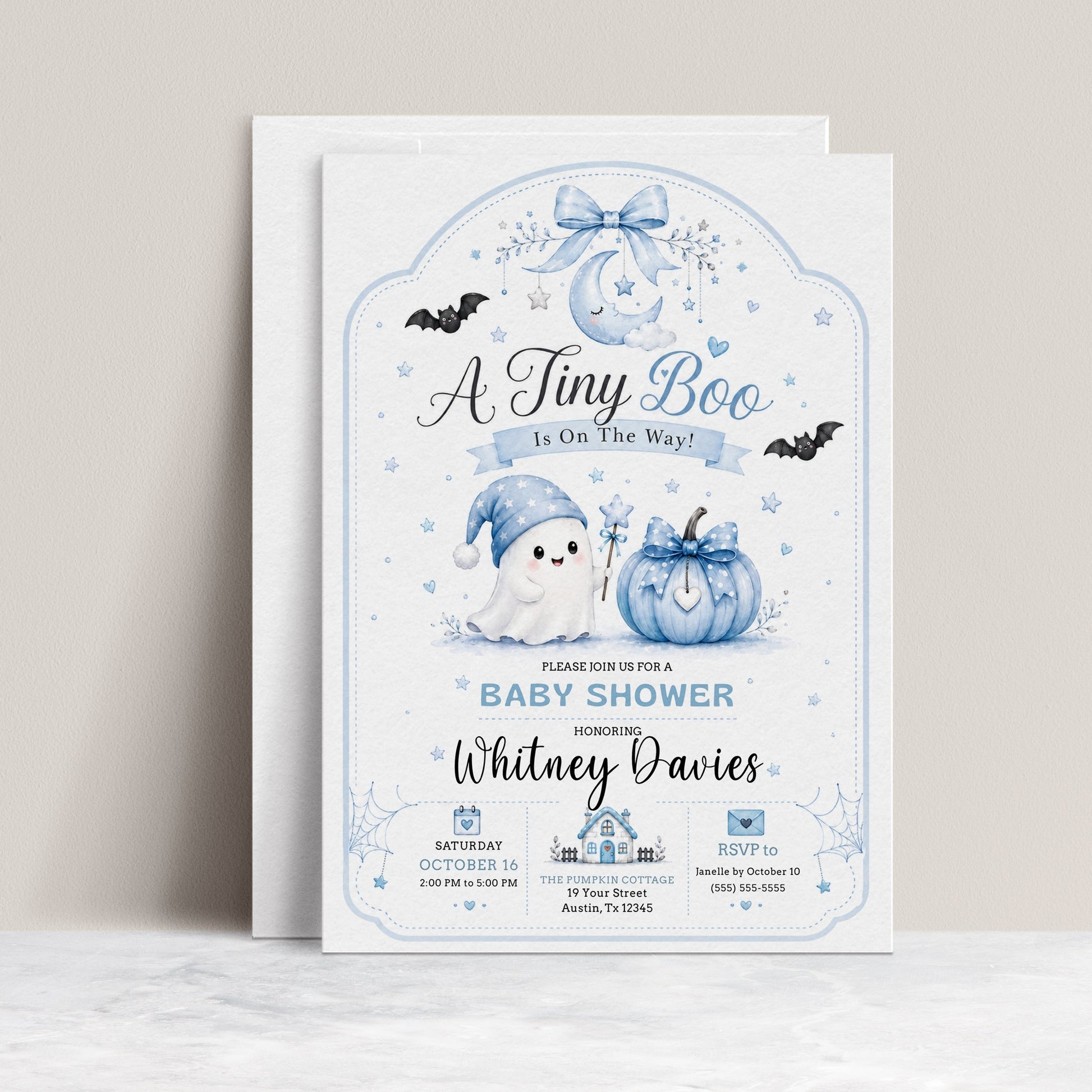 Tiny boo baby shower invitation with cute ghost, blue pumpkin, bats, crescent moon, stars, spiderweb accents, bow details, and soft Halloween baby boy design