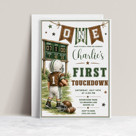 Football first birthday invitation with toddler football player, scoreboard, helmet, footballs, pennant banner, stars, field details, and green brown varsity style