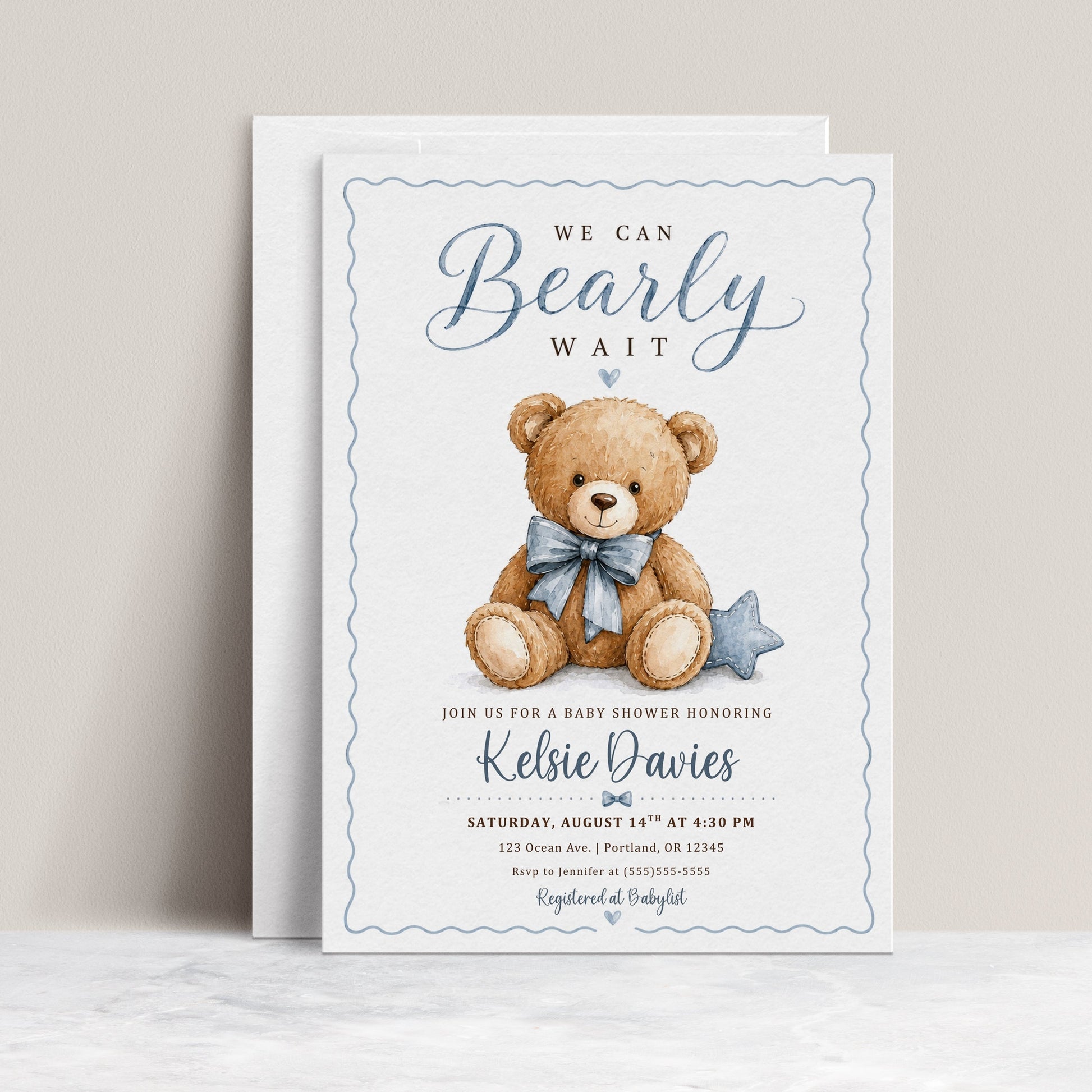 We can bearly wait baby shower invitation with watercolor teddy bear, blue bow tie, stitched star pillow, scalloped border, and soft blue baby boy details