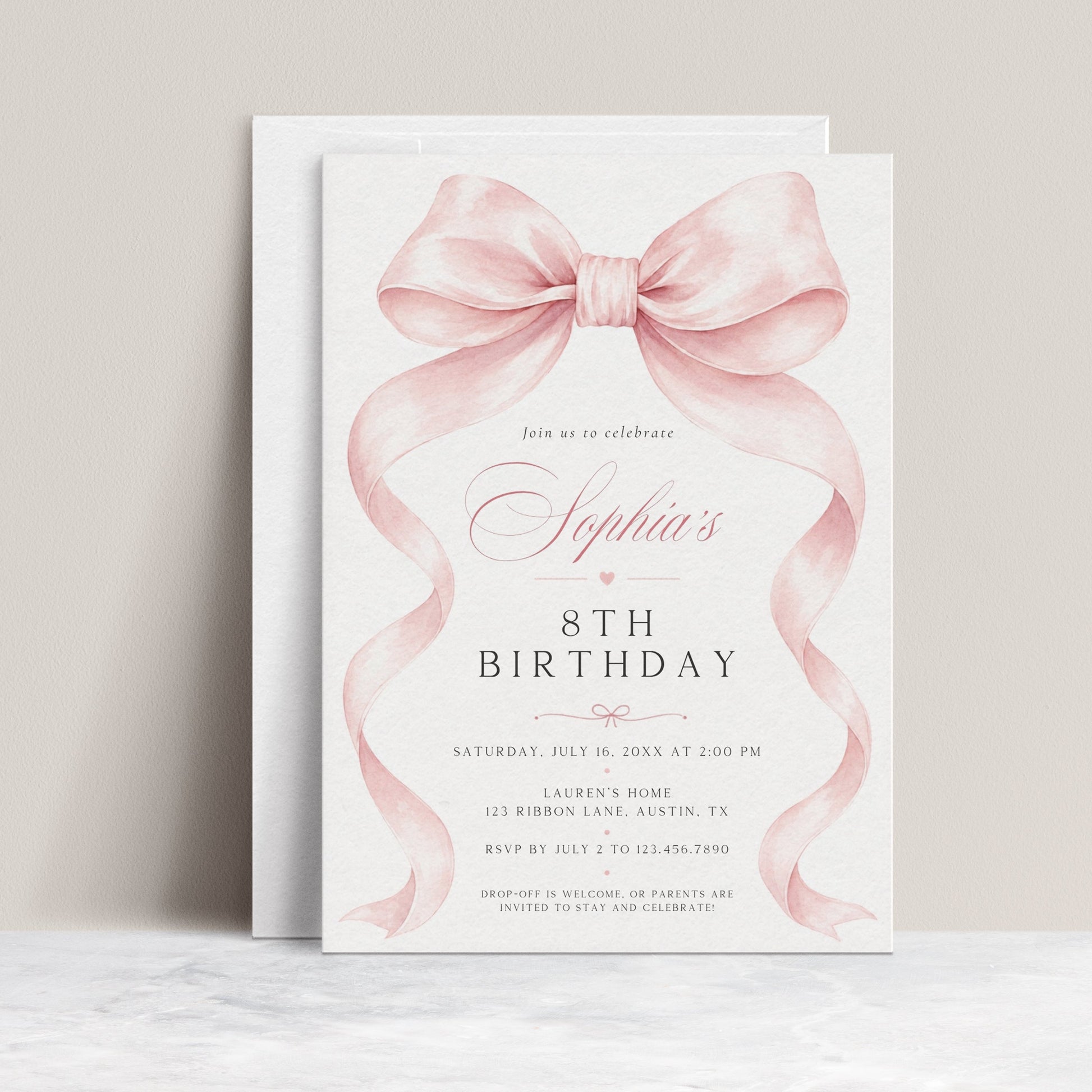 Pink bow birthday invitation for girls featuring a large blush pink ribbon, flowing bow tails and elegant pink and black typography.
