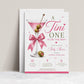 Editable martini baby shower invitation Canva template with pink martini glass, satin bow, heart-topped olive garnish, sparkle accents, and playful pink and olive green typography on a white background