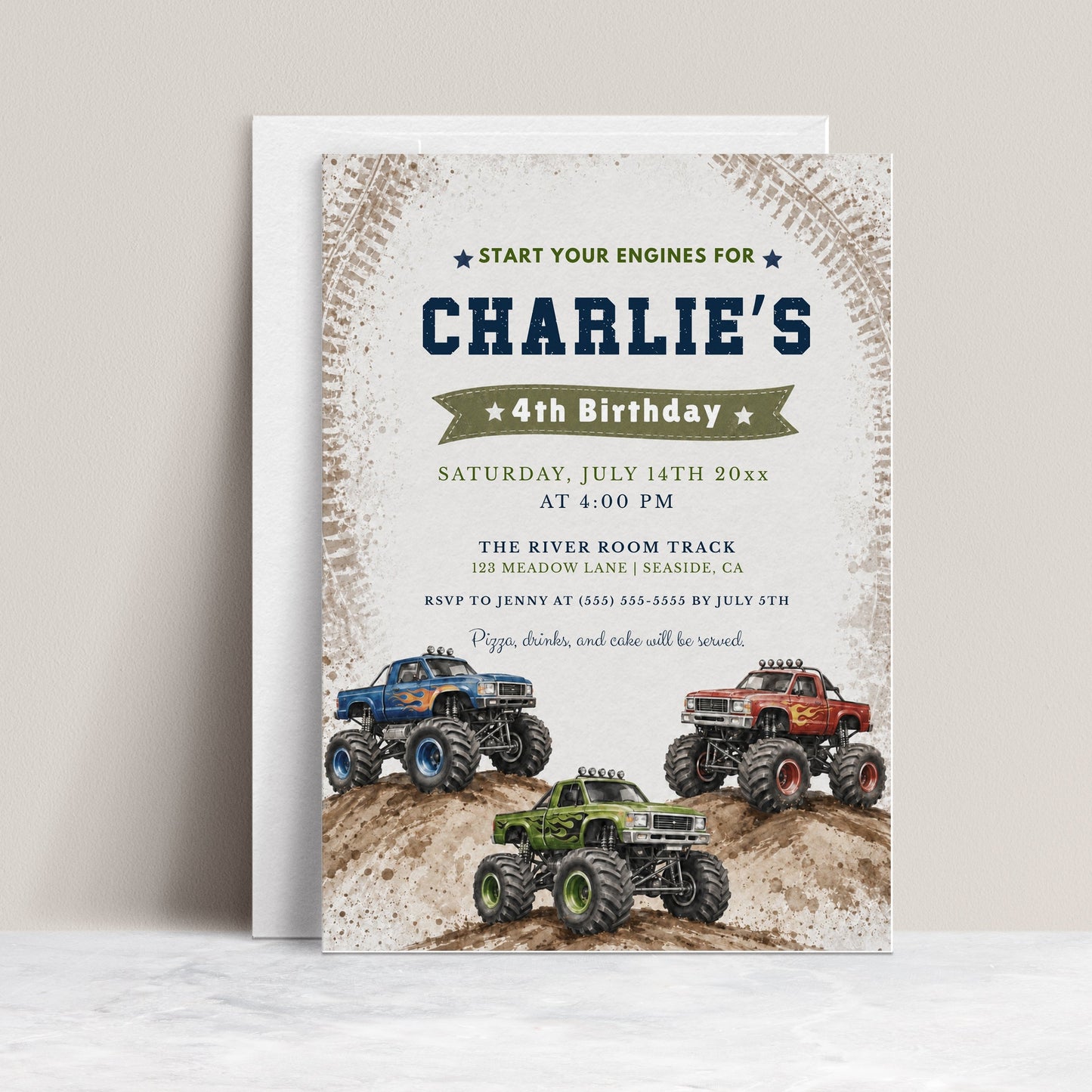 Monster truck birthday invitation featuring blue, red and green trucks racing over muddy hills with tire-track details.
