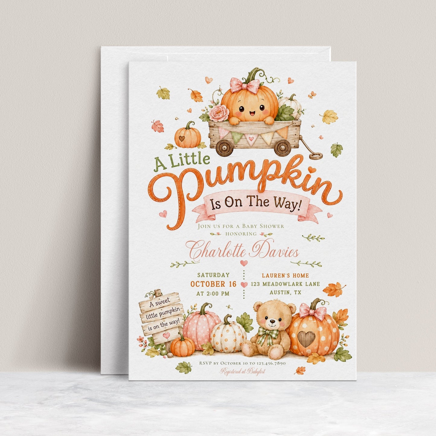 Little pumpkin baby shower invitation with pumpkins, teddy bear, wooden wagon, autumn leaves, pink bows, rustic sign, florals, and soft fall details