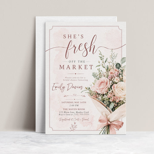 Editable fresh off the market bridal shower invitation Canva template with watercolour blush rose bouquet, baby's breath, eucalyptus, dusty rose bow, and script typography on a soft blush background with frame border
